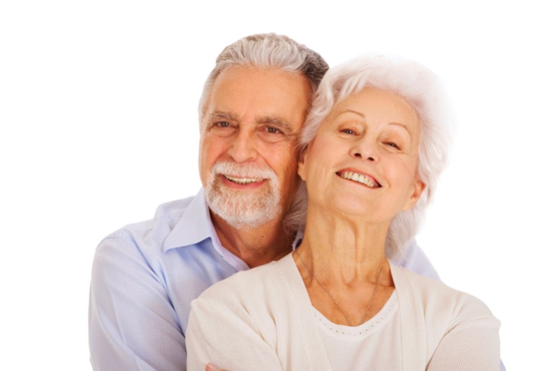 Smiling elderly couple